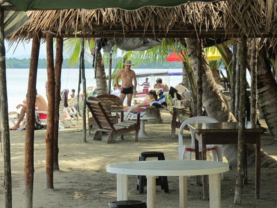 Tourists in the shade at Starfish Beach