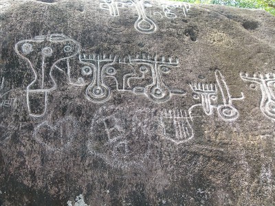 Some modern graffiti alongside the authentic drawings and carvings